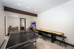 The game room features ping pong, shuffle board & video games.